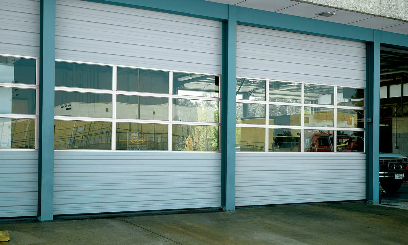 Professionals performing commercial garage door repair in Johnstown, Ohio, highlighting detailed workmanship and expertise.