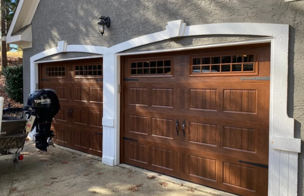 Local garage door repair technician servicing a garage door in Johnstown, Ohio.