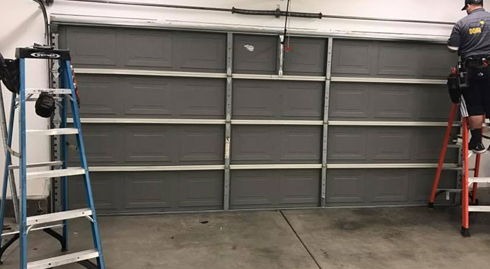 Team of technicians performing same-day garage door repair in Johnstown, Ohio.