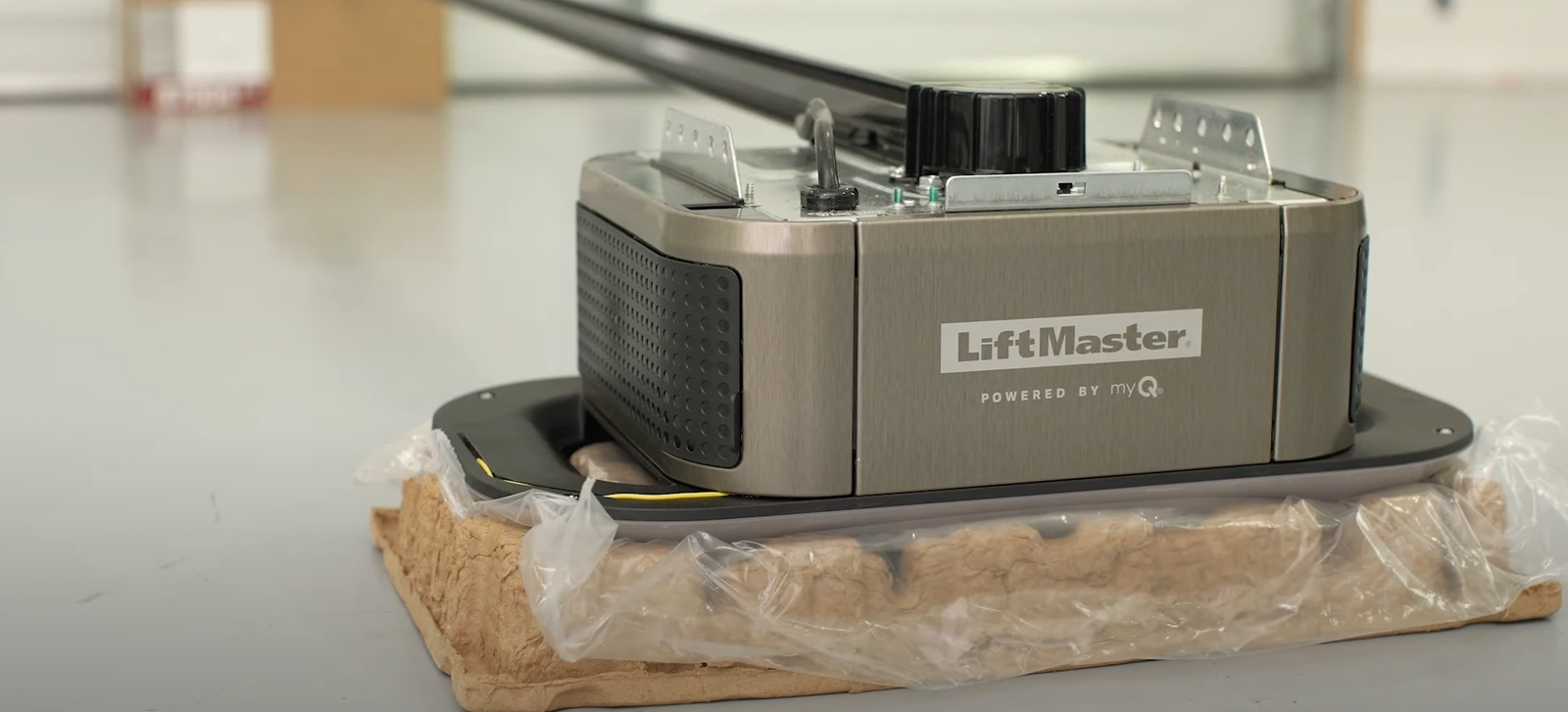 Close-up of a technician repairing a garage door opener in Johnstown, Ohio, highlighting expert garage door opener repair services