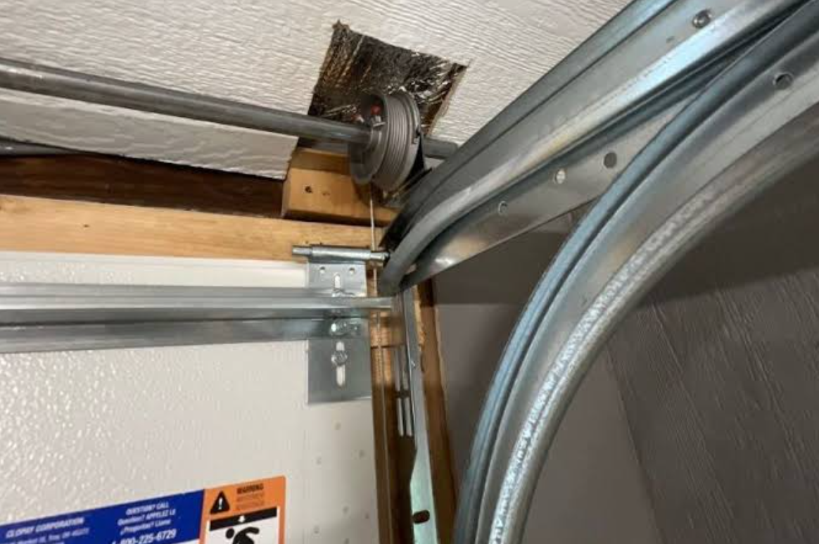 Off-Track Garage Door Repair Cable Fix Heath